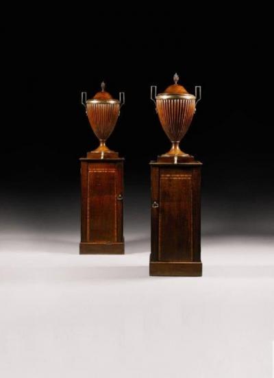 A fine pair of George III mahogany wine cisterns attributed to Gillows