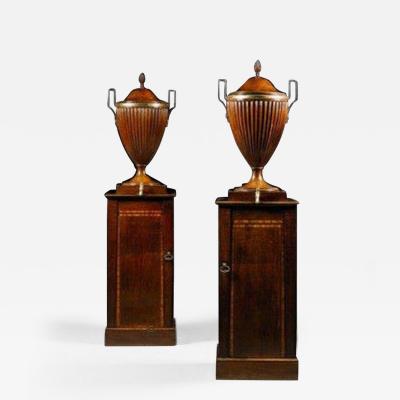 A fine pair of George III mahogany wine cisterns attributed to Gillows