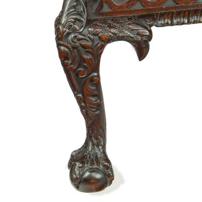 A fine pair of generous late Victorian mahogany eagle armchairs