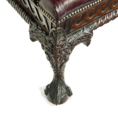 A fine pair of generous late Victorian mahogany eagle armchairs