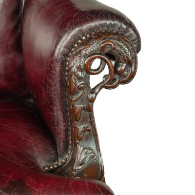 A fine pair of generous late Victorian mahogany eagle armchairs