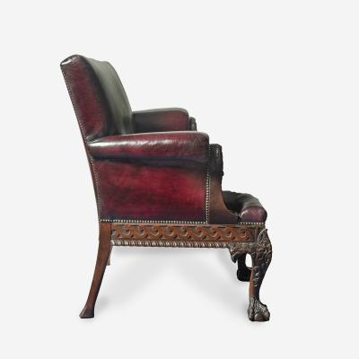 A fine pair of large late Victorian mahogany eagle sofas