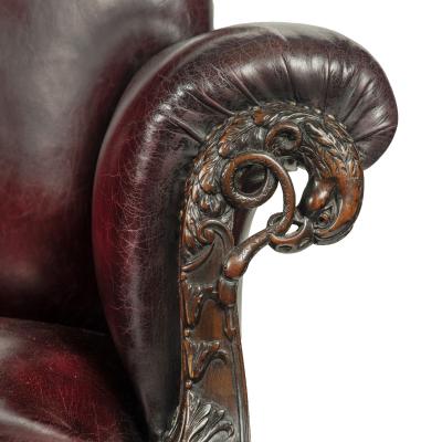 A fine pair of large late Victorian mahogany eagle sofas