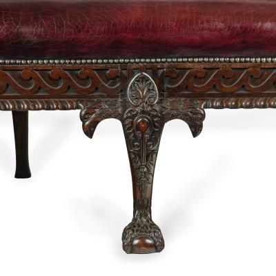 A fine pair of large late Victorian mahogany eagle sofas