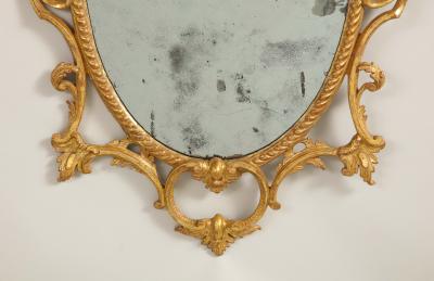 A fine pair of rococo looking glasses