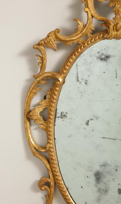 A fine pair of rococo looking glasses