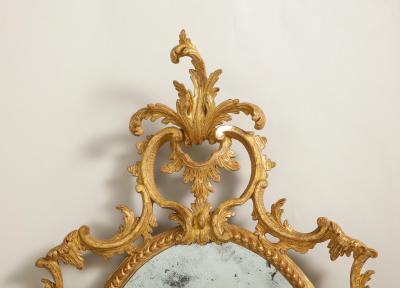 A fine pair of rococo looking glasses