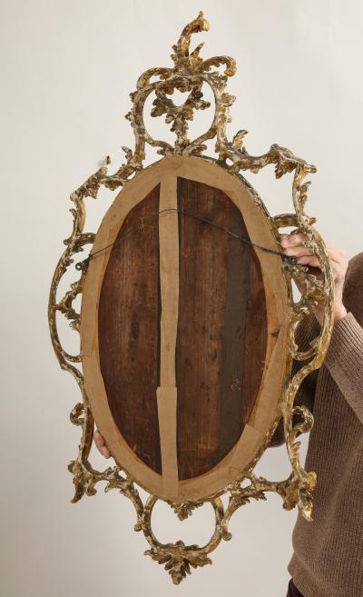 A fine pair of rococo looking glasses