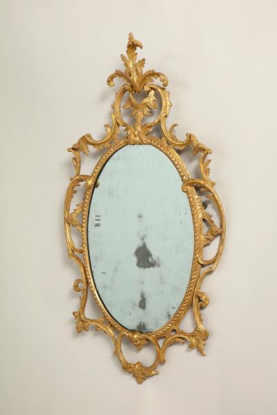 A fine pair of rococo looking glasses