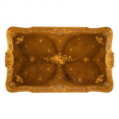 A fine walnut and burr walnut Orientalist centre table