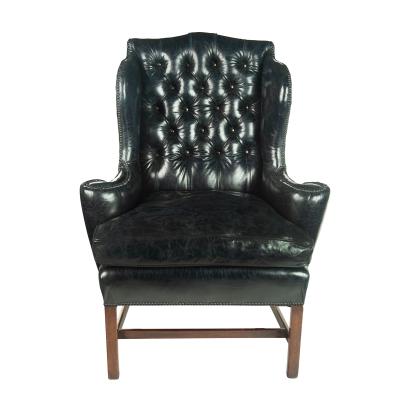 A generous George III wing arm chair