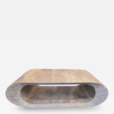 A geometric design tessellated grey marble coffee table