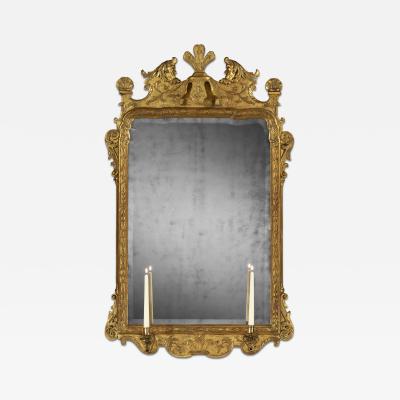 A george I Period carved and gilt gesso mirror