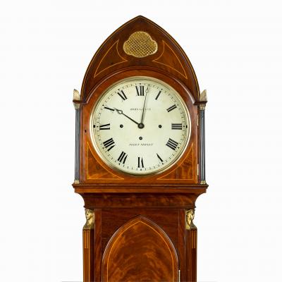 A good quality Regency Egyptian style mahogany longcase clock by John Grant
