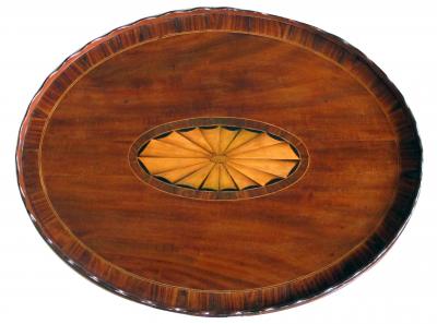 A handsome English George III style oval inlaid tray on stand