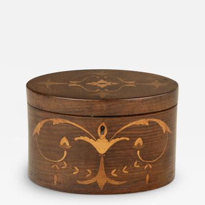 A harewood marquetry tea caddy with Royal Provenance