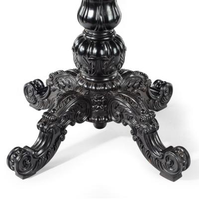 A large Anglo Ceylonese ebony and specimen wood centre table circa 1840