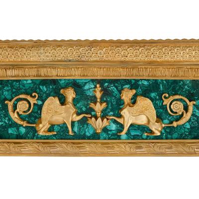 A large French Empire style gilt bronze and malachite centre table