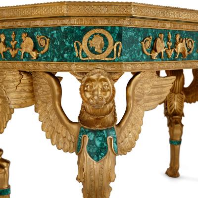 A large French Empire style gilt bronze and malachite centre table