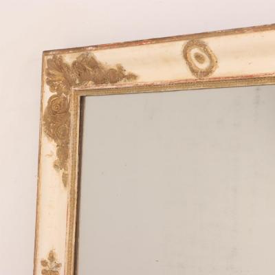 A large French Empire wood and gesso mirror C 1840