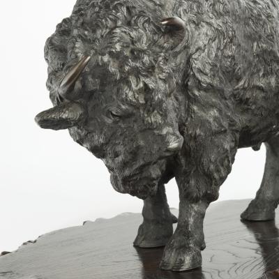 A large Meiji period bronze bison by Sano Takachika for the Kakuha Company