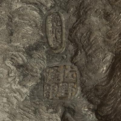 A large Meiji period bronze bison by Sano Takachika for the Kakuha Company