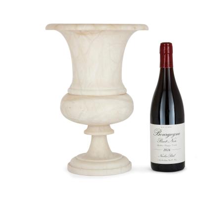 A large alabaster campagna shaped vase