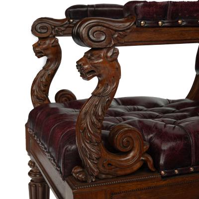 A large and fine pair of rosewood Regency armchairs
