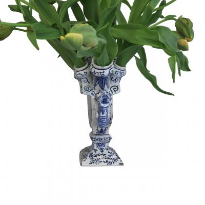 A large blue and white Delftware tulipiere