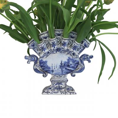 A large blue and white Delftware tulipiere
