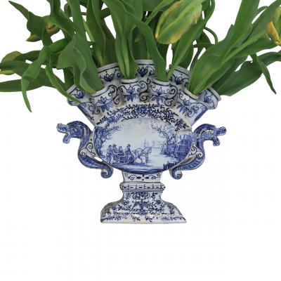 A large blue and white Delftware tulipiere