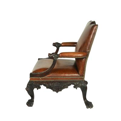 A large pair of Irish mahogany library armchairs in the Georgian style