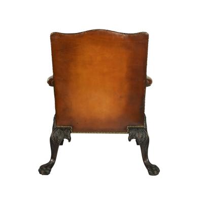 A large pair of Irish mahogany library armchairs in the Georgian style