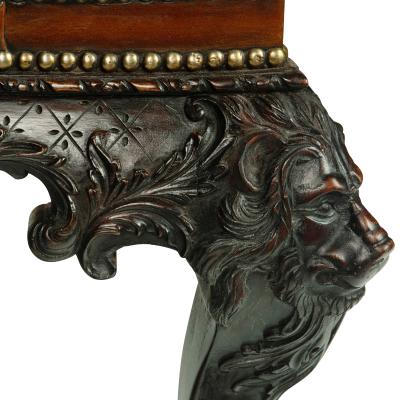 A large pair of Irish mahogany library armchairs in the Georgian style