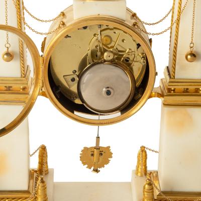 A late Louis XVI marble and ormolu portico clock