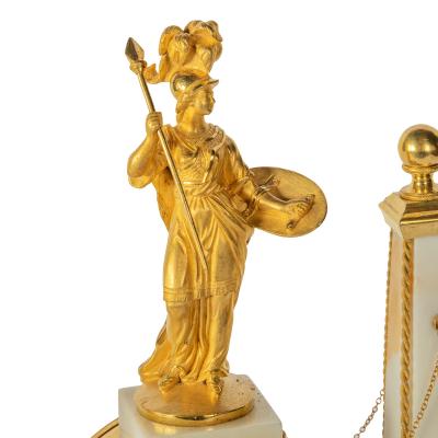 A late Louis XVI marble and ormolu portico clock