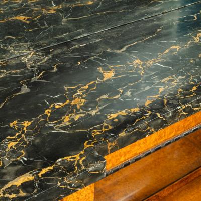 A late Regency portoro marble topped amboyna side cabinet