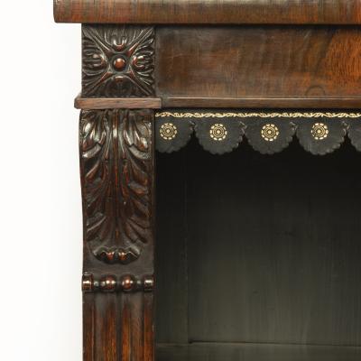 A late Regency rosewood breakfront open bookcase attributed to Gillows