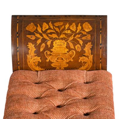 A late Regency rosewood window seat in the manner of George Oakley