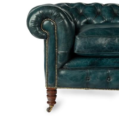 A late Victorian two seater Chesterfield sofa