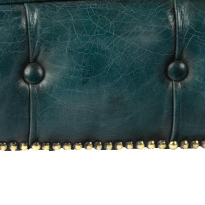 A late Victorian two seater Chesterfield sofa