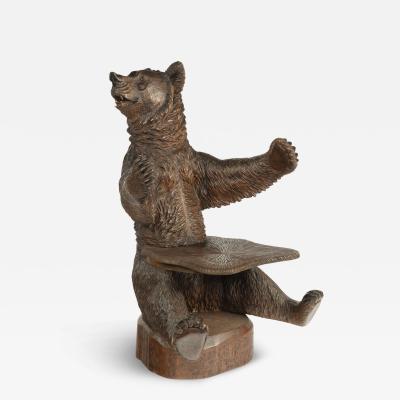 A linden wood Black Forest Bear armchair from Peter Trauffer