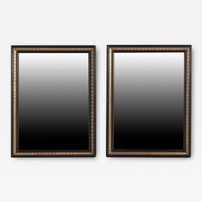 A magnificent pair of French black and gold mirrors 19th C 