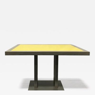 A matching pair of custom cerused oak and yellow lacquered dining tables