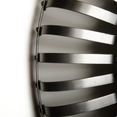 A mid century modern round industrial style mirror silver coated circa 1960