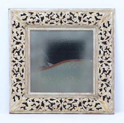 A modern silver gilt carved wood mirror 