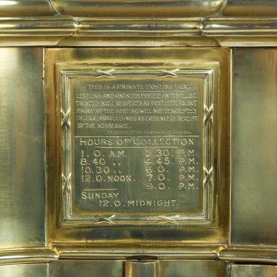 A most unusual Victorian brass private posting box