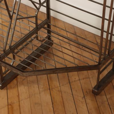 A nickel over iron Art Deco bakers rack with glass shelves French C 1930 