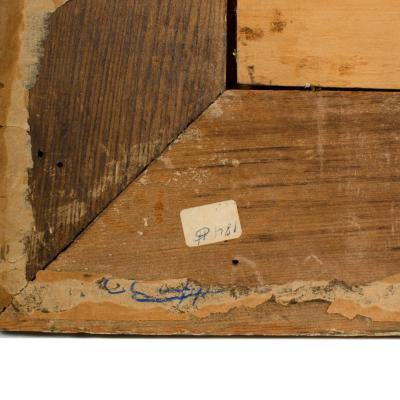 A oil on board painting of Bedouin men on beach in sunset signed indistinctly 