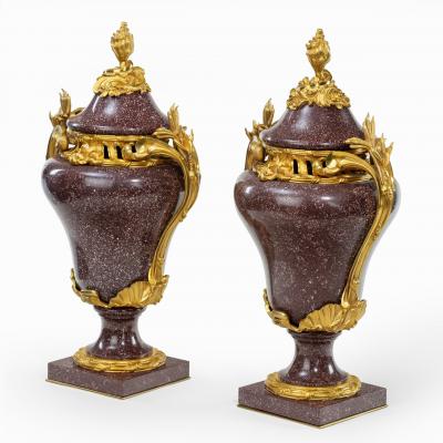 A pair Napoleon III Egyptian imperial porphyry urns and covers